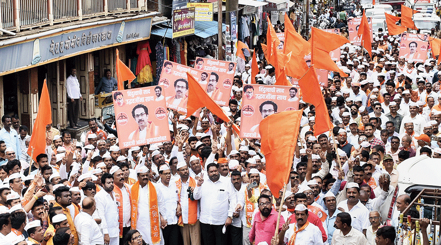 Shiv Sena workers at a protest rally against rebel leader Eknath Shinde in Kolhapur, Maharashtra, on Friday.