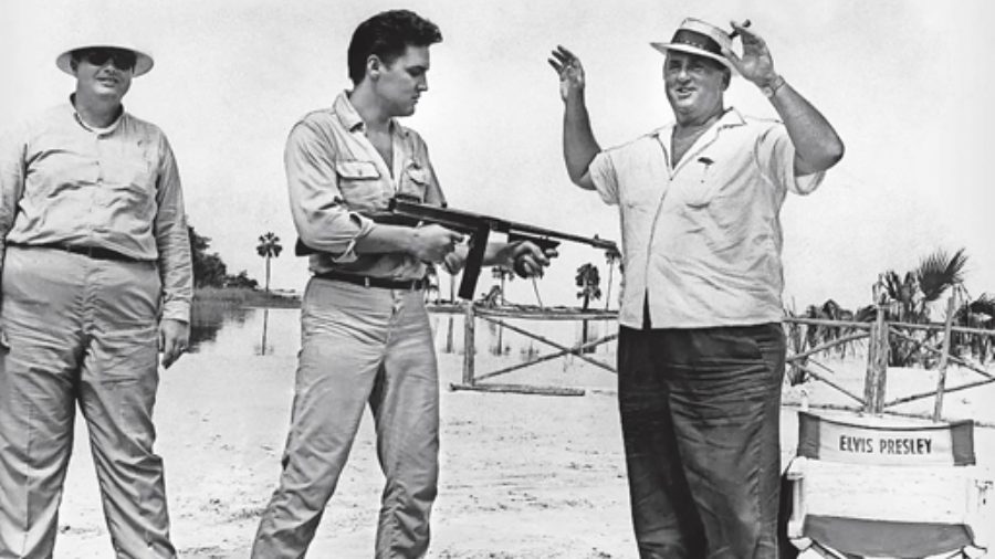 Elvis Presley and Colonel Tom Parker on the sets of a film that the King was working on