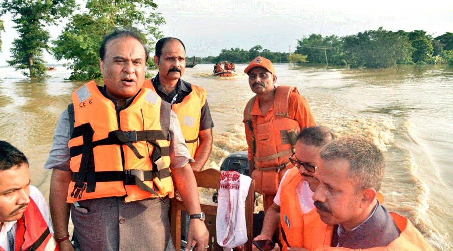 Assam chief minister Himanta Biswa Sarma inspects flood-affected areas in Nagaon district.