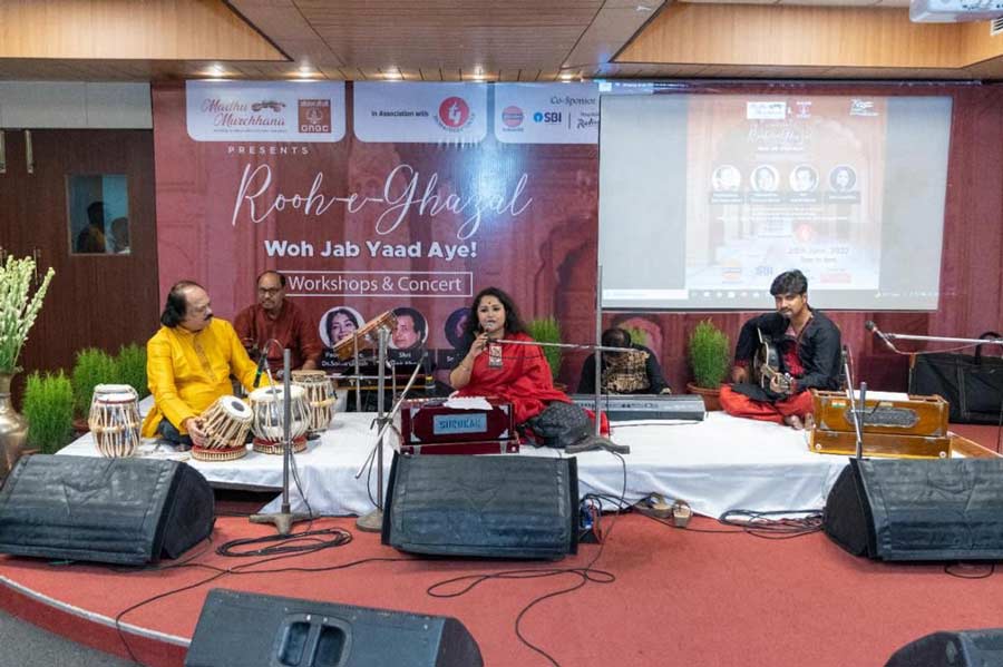 Vocalist Payel Kar performs a Nazrul Geeti in front of students and special guests.
