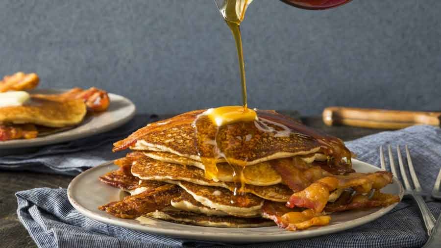 The classic combination of bacon and honey will elevate your pancakes effortlessly