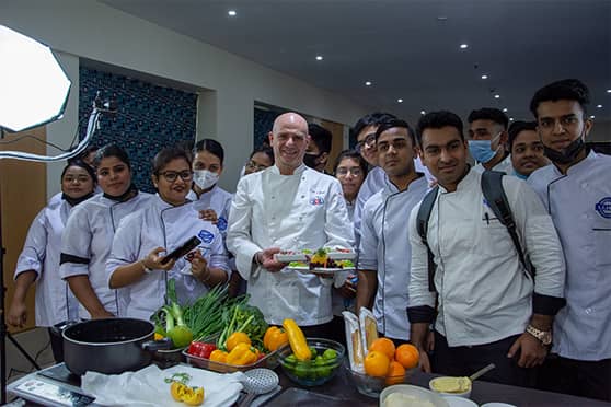 Chef Enzo Oliveri at IIHM masterclass with students.