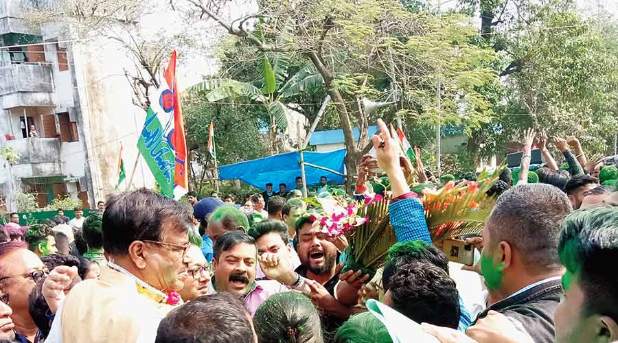Trinamul Congress leader Rabindranath Ghosh celebrates his win along with party supporters in Cooch Behar on Wednesday. 