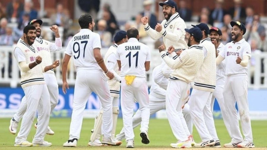 Virat Kohli celebrates a fall of an English wicket
