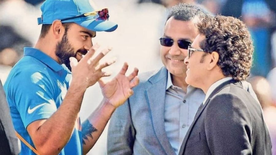 Virat with Virender Sehwag and Sachin Tendulkar
