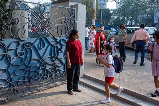 Aban Confectioner, the head of the primary and junior department of Modern High School for Girls, was there at the gate to greet the students and welcome them back.
