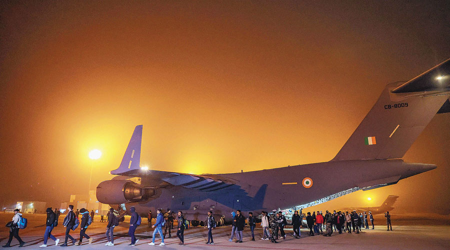 Indians evacuated from war-hit Ukraine reach the Hindon Air Force Station in Ghaziabad early on Thursday. As part of Operation Ganga, the first IAF C-17 Globemaster aircraft carrying 200 passengers, mostly students, returned to Hindon airbase near Delhi from Bucharest around 1am. 