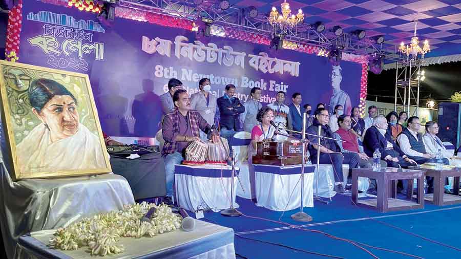 A Lata Mangeshkar portrait on stage on the final day. 