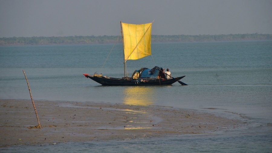 Dusk makes the blue-green waters of the Sunderbans’ rivers gleam golden and many fisherfolk make their way home before evening sets in with their boats’ sails fluttering in the cool breeze — a feature of all seasons on the water 