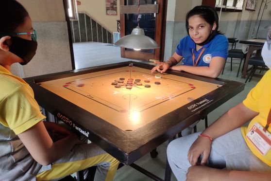 Instead of relying on digital devices to keep them connected, students were able to once again play games such as carrom with their peers.