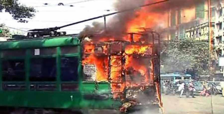 A tram on fire near Mullickbazar on Friday. The fire broke out in the air-conditioned tram while travelling from Gariahat to Esplanade due to some technical glitches