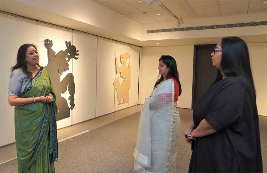 MASTER SHOWCASE: Writer, curator and collector Ina Puri shows a cut-out artwork of Maqbool Fida Husain to Richa Agarwal, CEO of Emami Art, and Ushmita Sahu, head curator, Emami Art, at an ongoing exhibition of MF Husain’s cut-outs at Emami Art gallery near Anandapur in south Kolkata on Tuesday, March 1