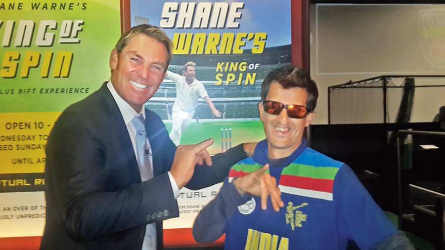 The author with Warne at the the basement of the Melbourne Cricket Ground where the cricketer was inaugurating his virtual reality experience