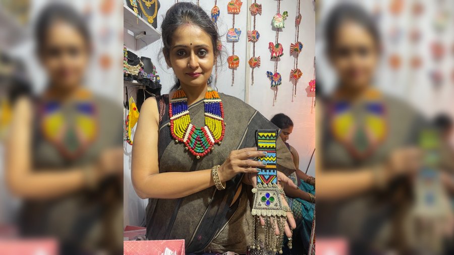 Moumita Banerjee wearing Naga style necklace and displaying mix and match Naga-Afghan style neckpiece.