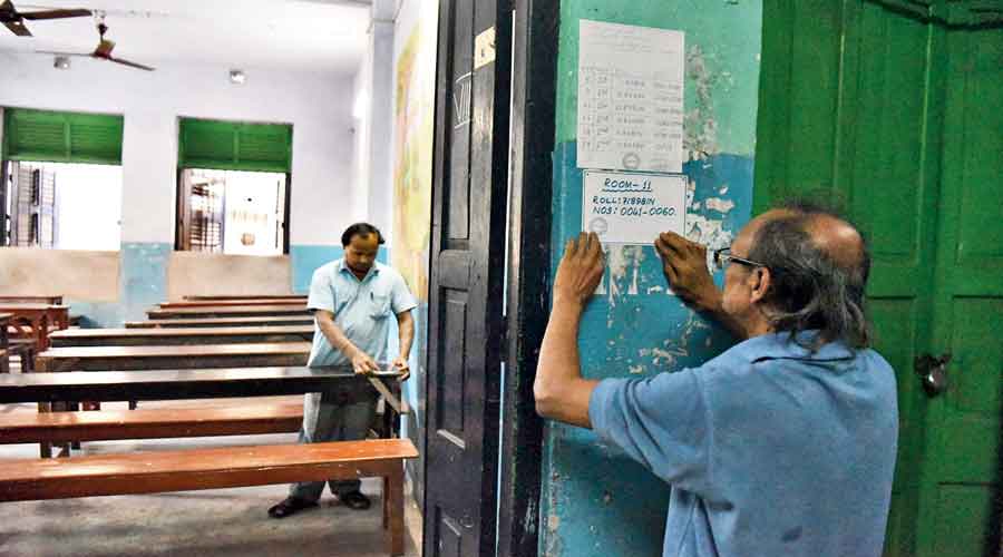 Roll numbers of Madhyamik examinees being pasted at a school in Calcutta on Sunday. 
