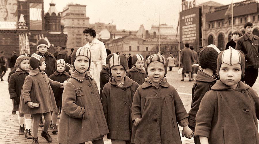 1968: A party of Russian schoolchildren on a school trip in Moscow's Red Square. 