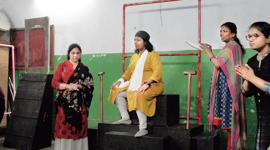 The women at a rehearsal for the play