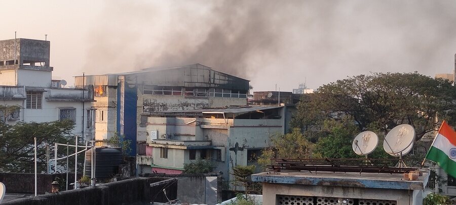 Black smoke rises out of a godown on fire at Lake Gardens in south Kolkata on Tuesday evening