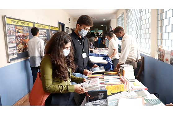 Students browsing the variety of books and new titles on display at the exhibition. 