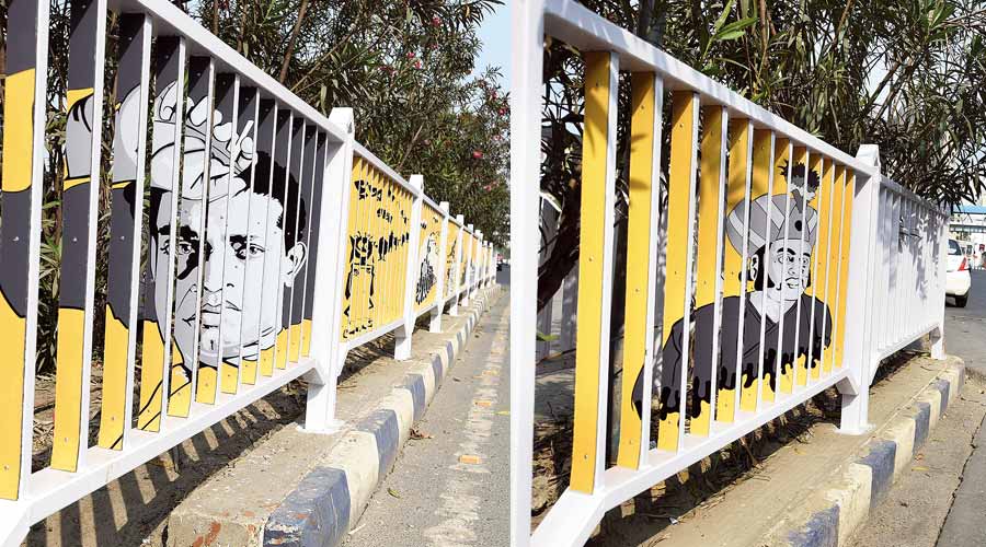 A portrait of Satyajit Ray and (below) a scene from Hirak Rajar Deshe painted on iron guardrails. 