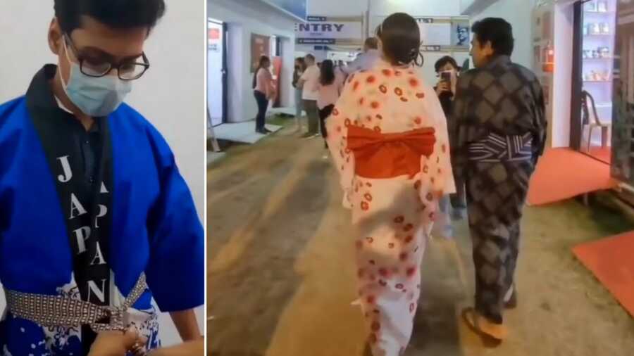 (Left) a visitor tries out the ‘happi’ coat at the Japan pavilion and (right) a couple walk wearing ‘yukatas’ at the book fair
