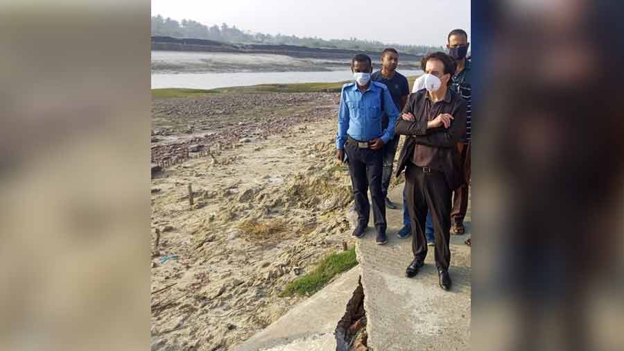 Talpain and other local officials take stock of the damages left in the wake of the cyclone Yaas on Sagar island