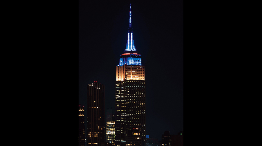 The Empire State Building is illuminated in the colors of the Ukrainian flag, late Friday, March 4, 2022, in New York. 