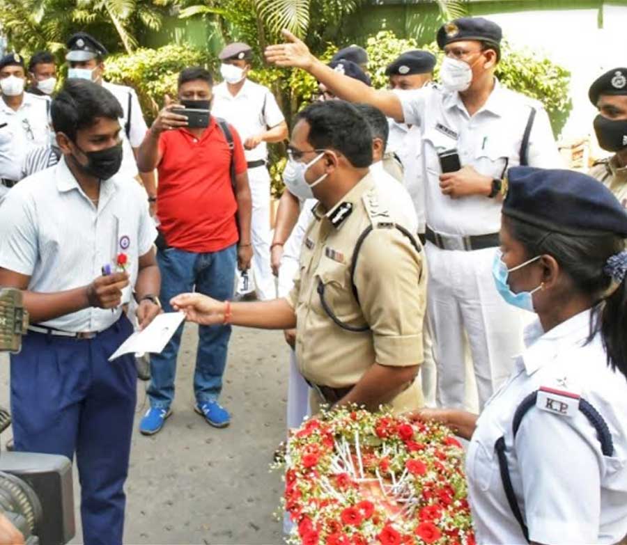 BEST OF LUCK: Kolkata police commissioner Vineet Kumar Goyal greets Madhyamik examinees before the exam at St Lawrence High School on Monday, March 7
