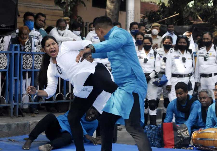 TEASERS, BEWARE!: Artistes perform in a street drama organised by Kolkata police on the occasion of International Women’s Day on Tuesday, March 8, near Esplanade