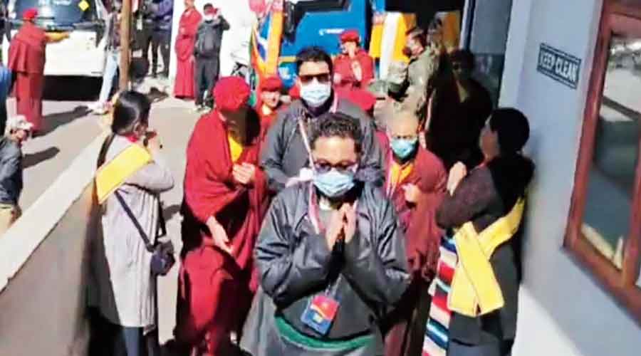 Namgyal with monks at the Buddhist monastery in Dali of Darjeeling on Saturday.