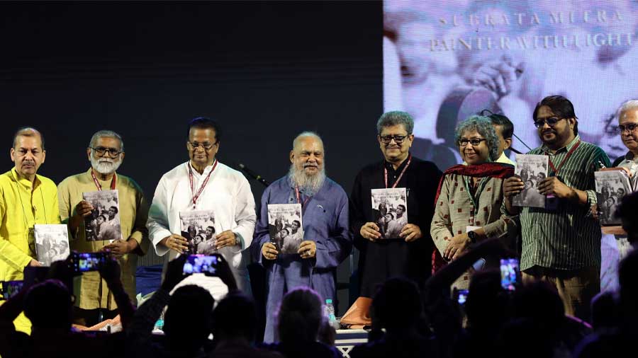 Shuvaprasanna and Future Hope CEO Sujata Sen alongside other dignitaries release the book 'Subrata Mitra: Painter with Light', published by West Bengal Heritage Commission