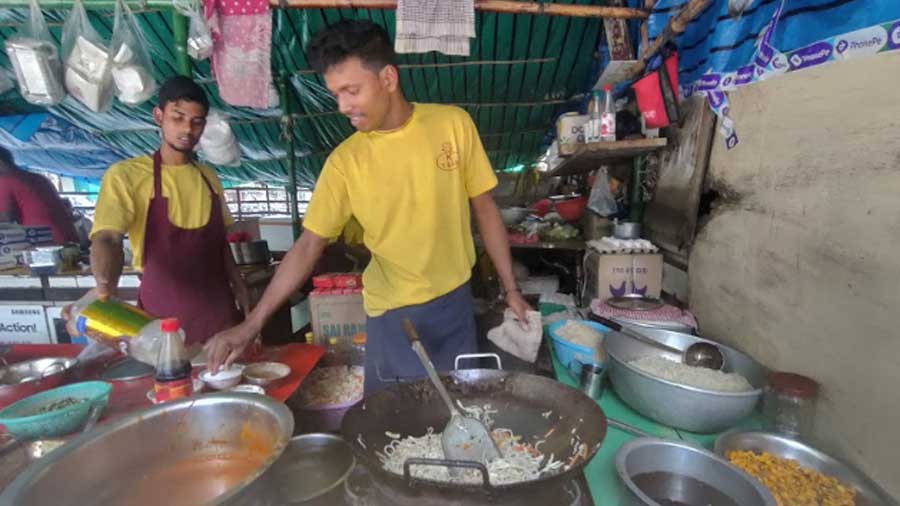 Nandan from Kartik Tea & Fast Food is well known for his chowmein-tossing tricks