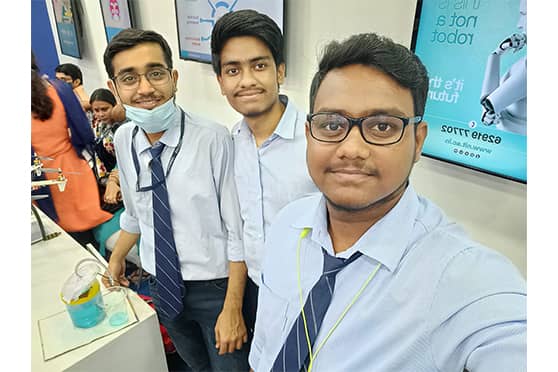 (L-R) Snehangshu Das, Sayan Halder, and Sumit Saha — the team that made the contactless sanitiser model.  