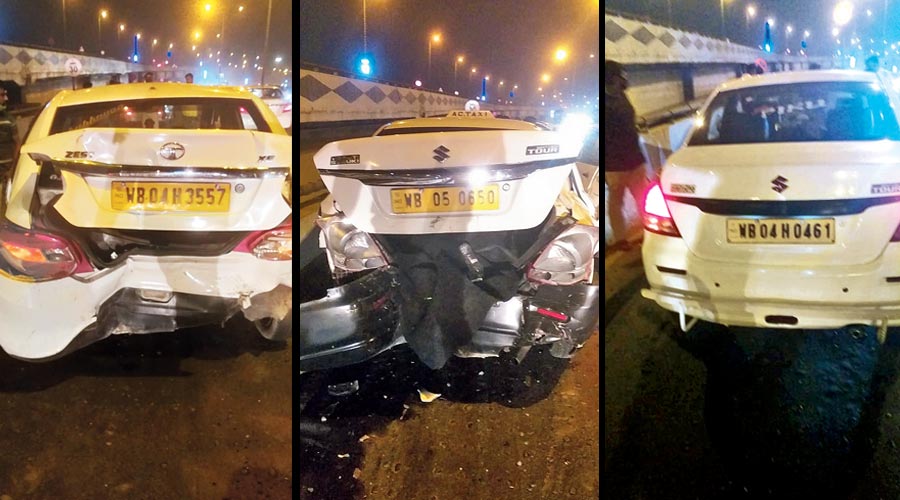 The app cabs that were damaged in the collision on the Parama flyover on Sunday night