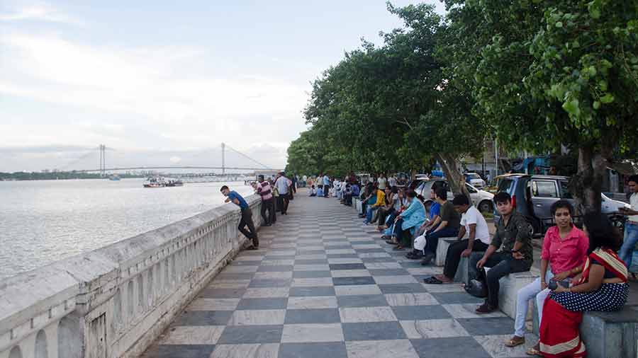 The paved riverfront at Howrah has seats for visitors