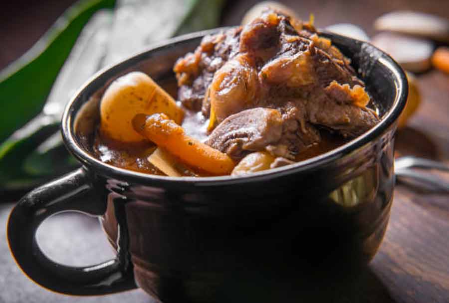 OXTAIL STEW: This is an ambraosial broth, best served in the nippy winter months. It’s packed with a host of vegetables that adds a good bite of crunch to the soup-y delight. Serve this with a good ol’ German loaf! 