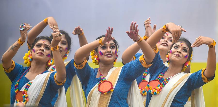 Students perform as they celebrate Basant Utsav festival in Calcutta.