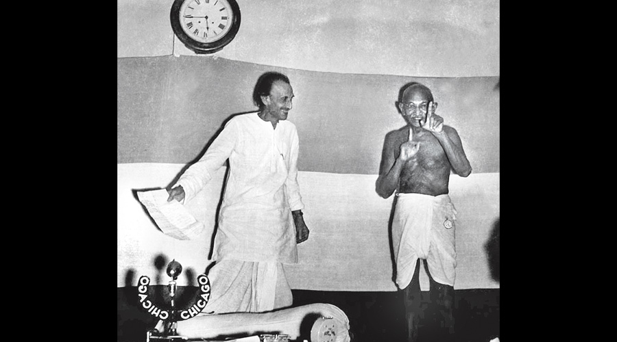 Mahatma Gandhi sharing a joke with Acharya Jivatram Bhagwandas Kripalani at the All India Congress Committee session, Delhi