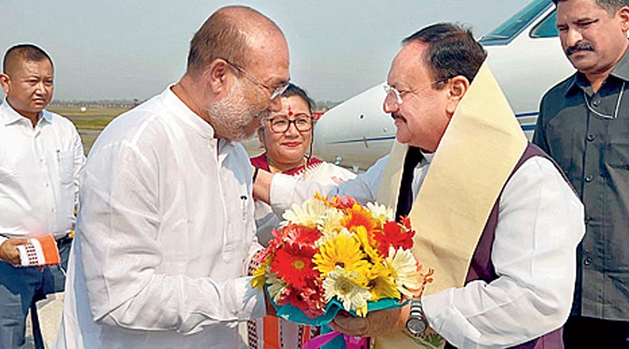BJP National President JP Nadda being greeted by Manipur CM-designate Biren Singh at Imphal airport.