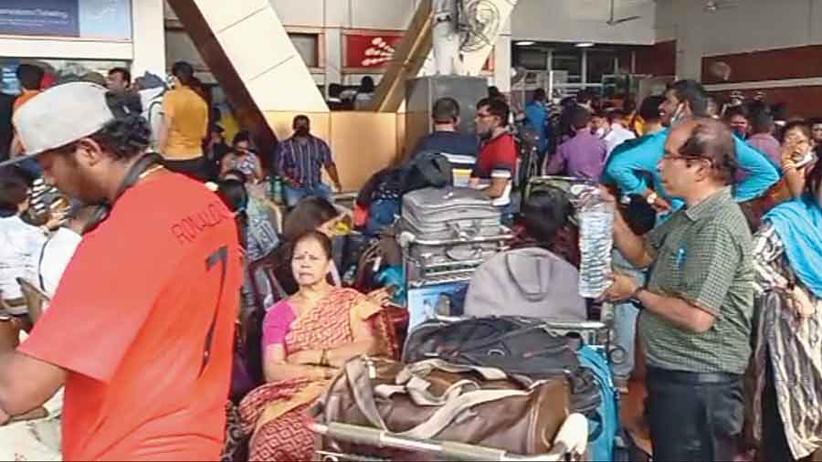Passengers at the Bagdogra airport on Tuesday. 
