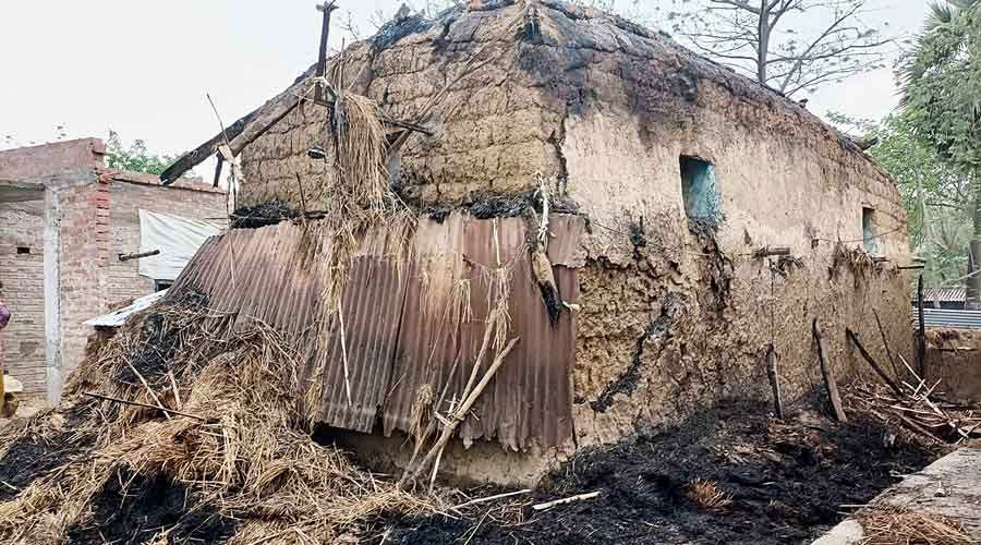 One of the houses that was charred in the fire at Bogtui village in Birbhum’s Rampurhat on March 21.