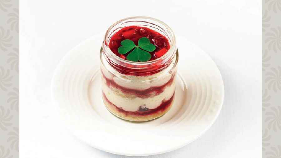 Citrus-infused cheesecake, alternatively layered with coconut meringe and raspberry cream, this dessert packs in a lot of fruitiness made with lot of love!