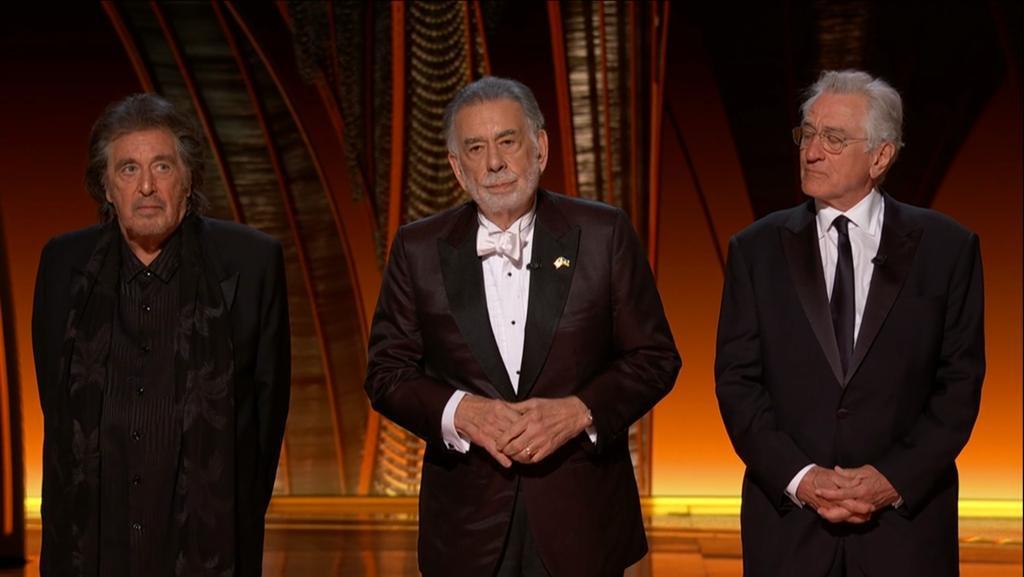 From left: Al Pacino, Francis Ford Coppola and Robert De Niro on stage at the Academy Awards 