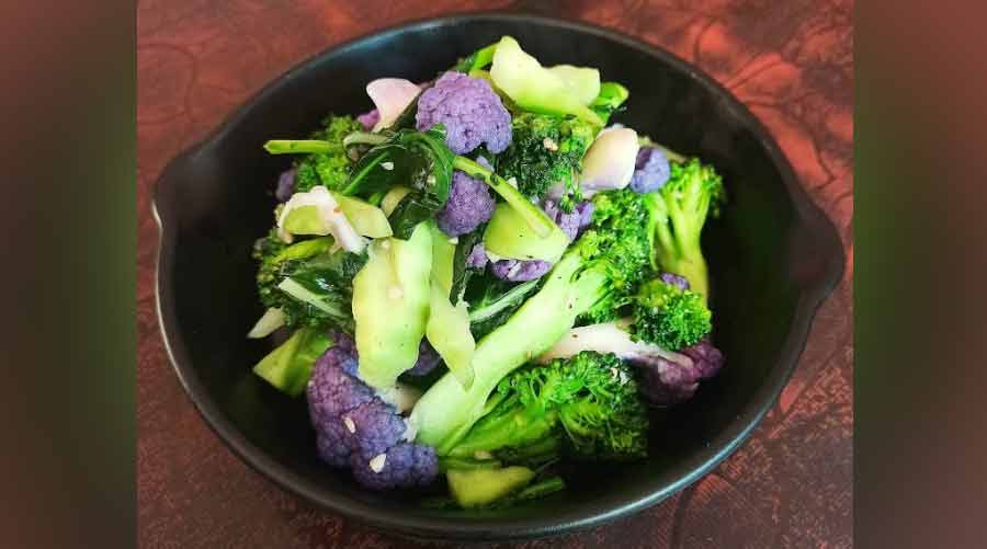 Stir fry purple cauliflower and tender broccoli. ‘When people think of Nagaland, they think of it as a place where you only get meat and I want to break that stereotype,’ says Basumatari 