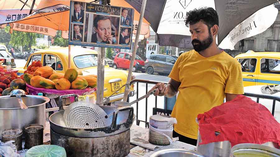 Anurag Chauhan at his vada stall in front of Vardaan market on Camac Street on Tuesday. 