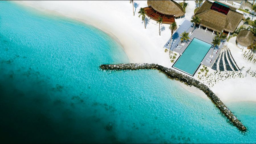 The infinity pool looks into the ocean