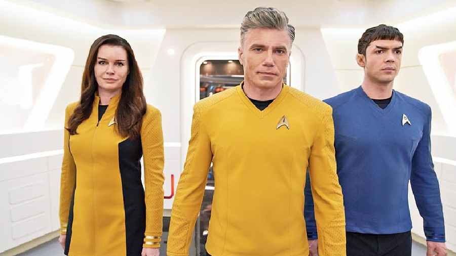 (L-R) Rebecca Romijn, Anson Mount and Ethan Hunt in Star Trek: Strange New Worlds, premiering on May 5