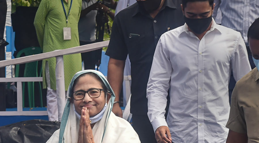 West Bengal Chief Minister Mamata Banerjee and her nephew and TMC MP Abhishek Banerjee leave after greeting Muslims on the occasion of Eid-ul-Fitr