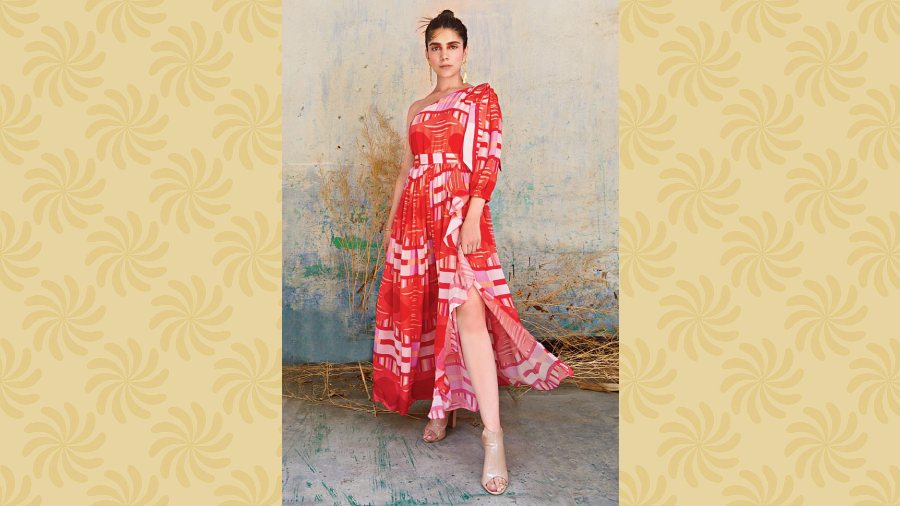 Neha has played around with geometrics in her collection this time. This slit dress is just right to sip your mocktail in on a hot summer afternoon.