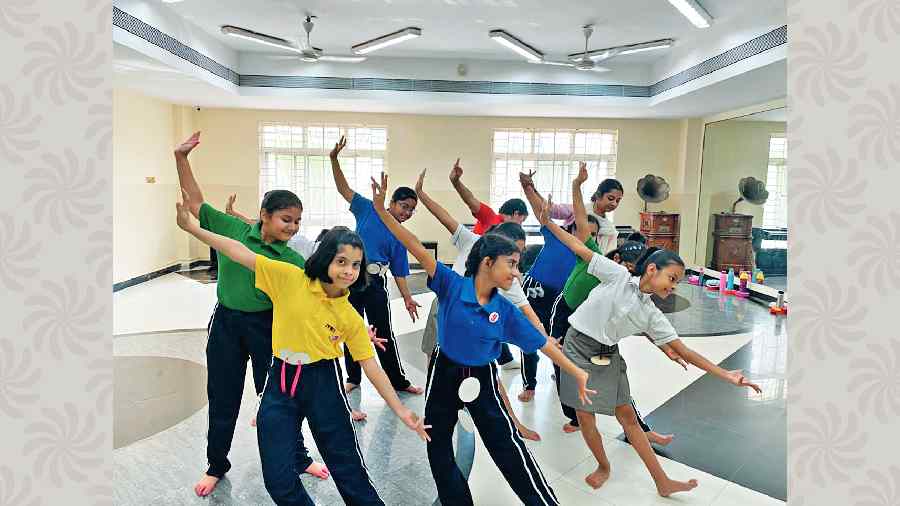 Students of Indus Valley World School rehearse for a Rabindra Jayanti programme
